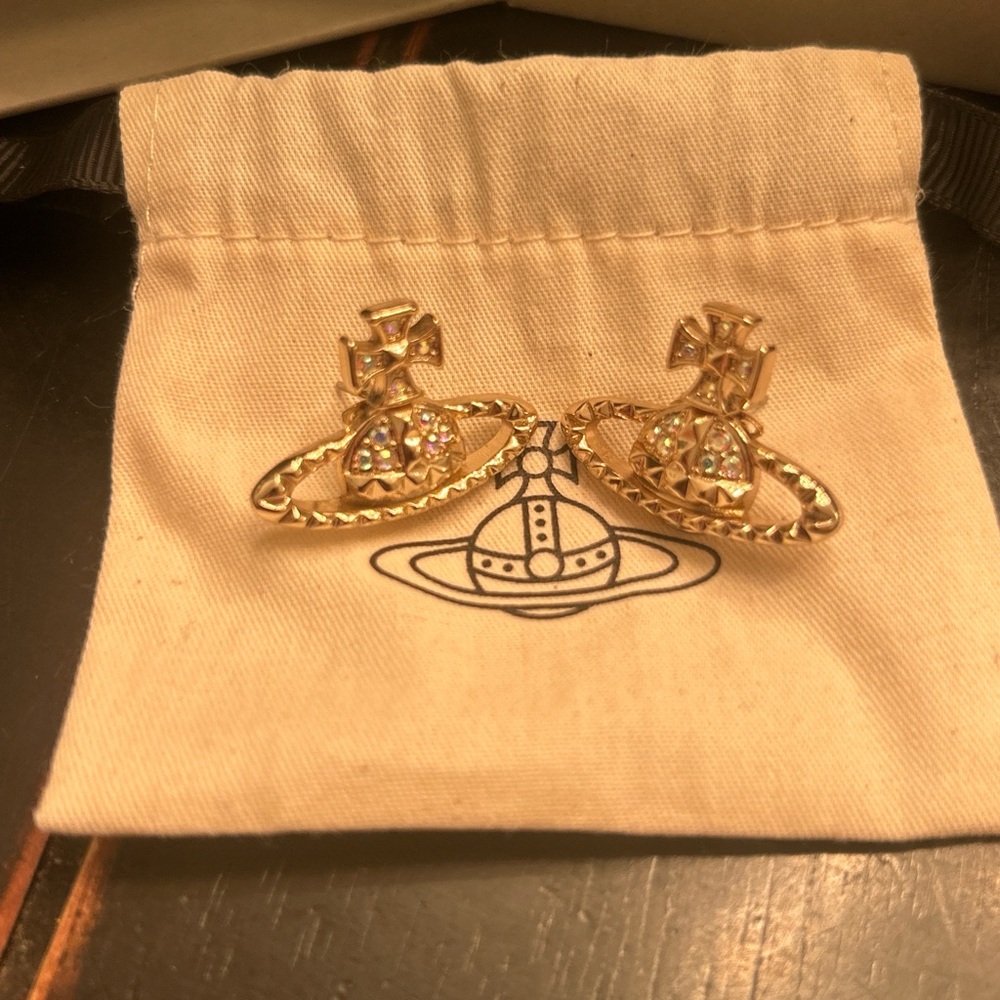 Vivienne Westwood Mayfair Bas Relief earrings. Original package w/ authenticity.